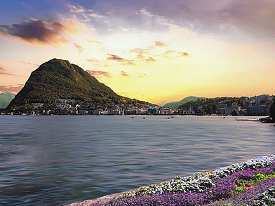 Sonnenuntergang am Luganersee mit Bergkulisse – Freizeit und Erholung auf der Italienisch-Sprachreise Lugano.