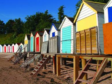 Bunte Hütten am Strand von Torquay, Englisch Sprachreisen für Erwachsene